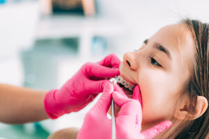 young girl braces checkup